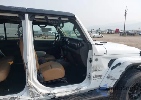 2023 Jeep Wrangler 4-Door Sahara 4X4 from USA, damaged, VIN 1C4HJXEMXPW593460